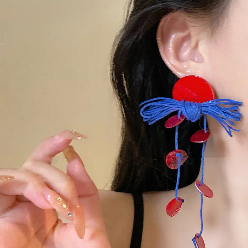 Geometric cloth women's earrings with 30 Silver Needle-blue resin flower colour and round design elements.