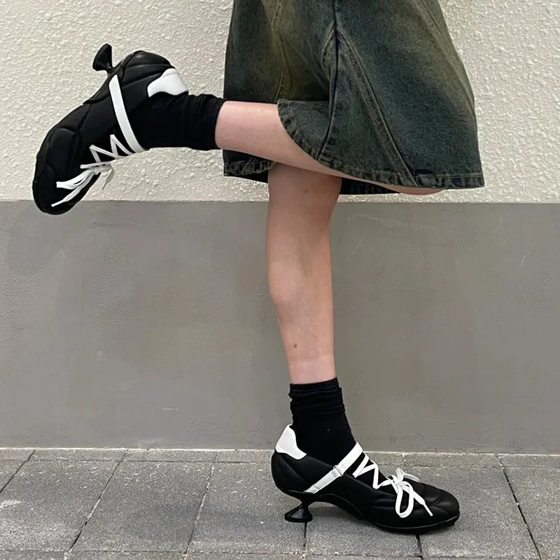 Women's silver lace-up sports shoes with creative bow detail on front, round toe and mid heel