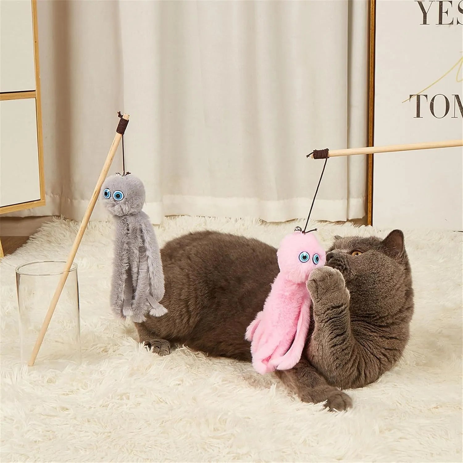 Octopus-themed cat toy with long stick attachment in bright colours for indoor feline play