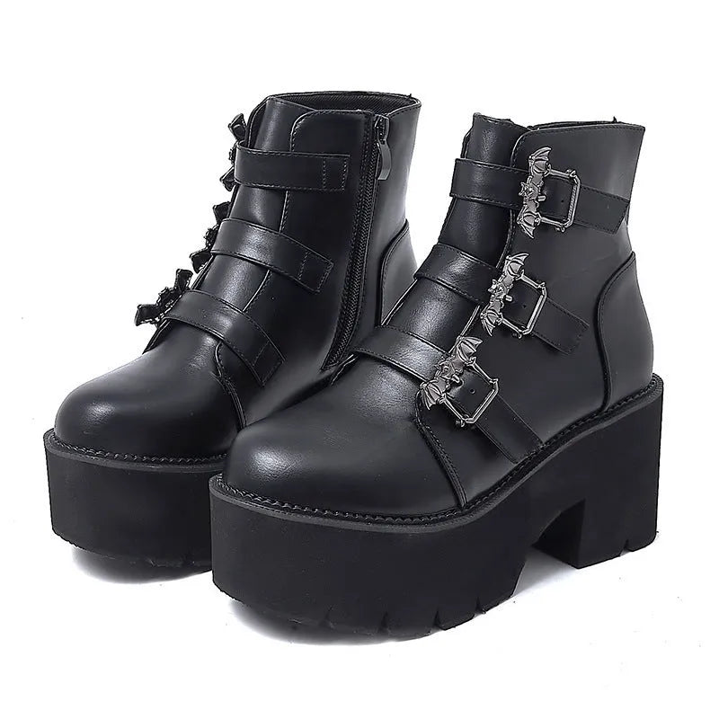 Black women's punk ankle boots with bat buckle and side zip closure