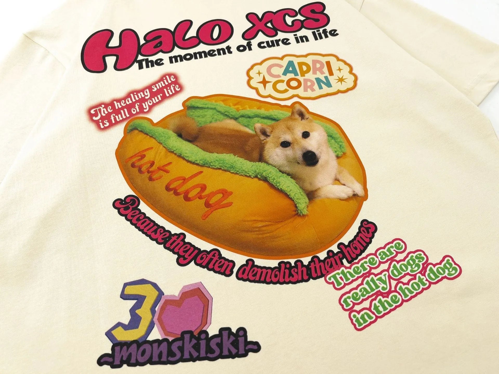 Cartoon hamburger dog printed loose fit T-shirt in apricot, sky blue, or white.