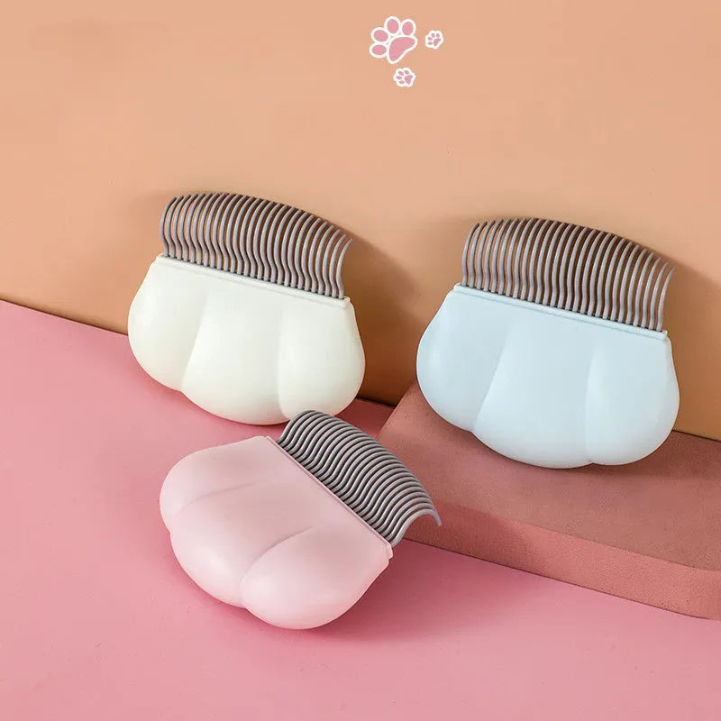 Paw soft deshedding grooming brush for cats and dogs with blue rubber grip handle