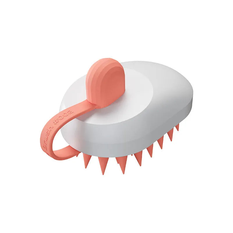 Soft silicone handheld pet hair remover and massage brush in dark blue on a white background.