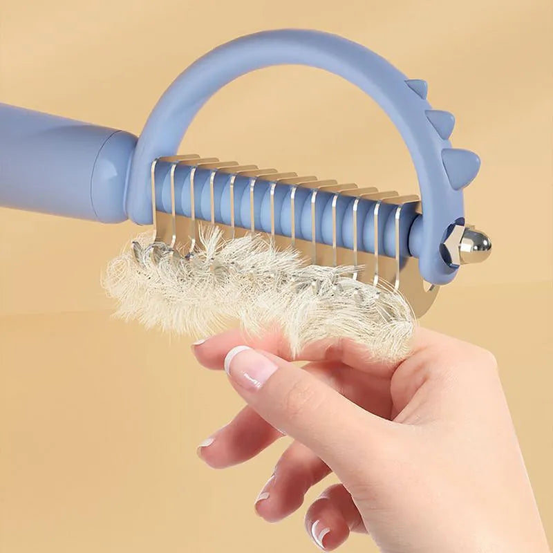 Self-cleaning slicker cat brush with dinosaur shape, double-sided for shedding and dematting, blue green white options