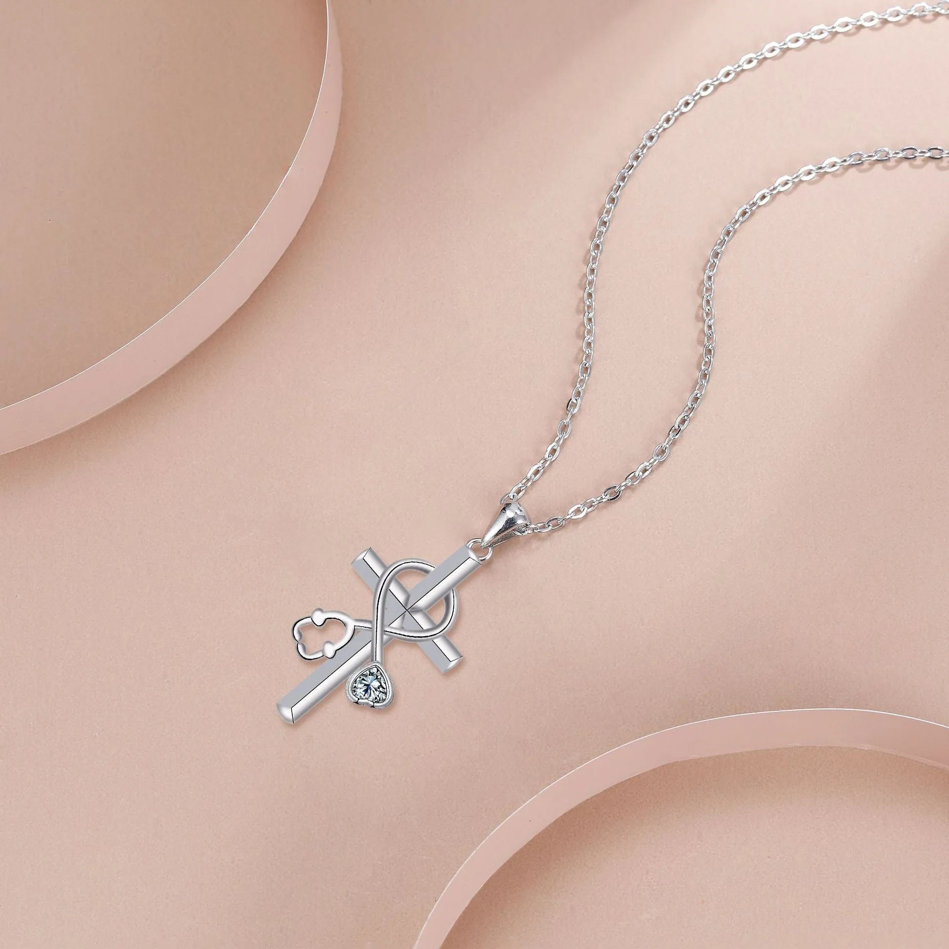 Women's cross stethoscope necklace with electroplated copper pendant and medical-themed design