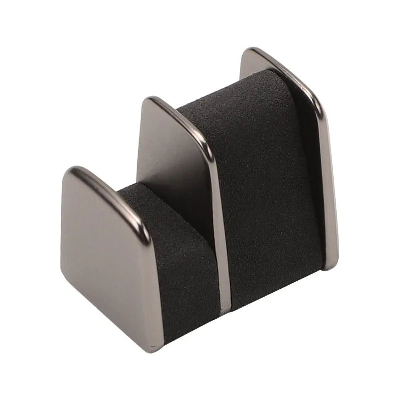 Zinc alloy car dashboard glasses holder in four colours measuring 3.7x3.2x2.5 cm