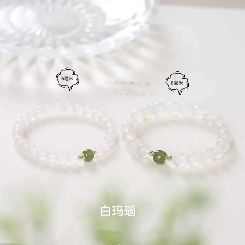 Natural white agate crystal bracelet with cinnabar inlay and text detail, handmade, 6mm and 8mm beads