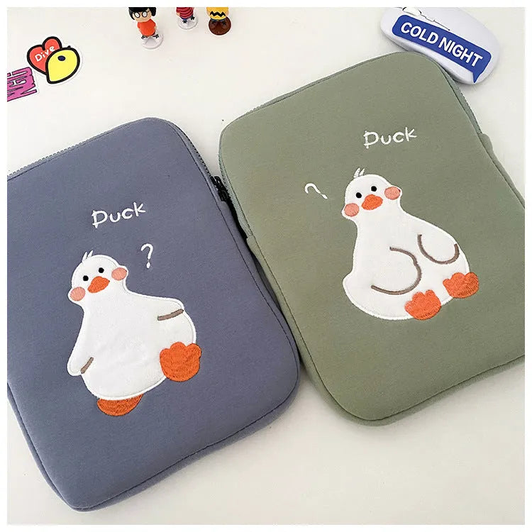 Blue cotton tablet case with duck embroidery design and zipper closure for iPad protection