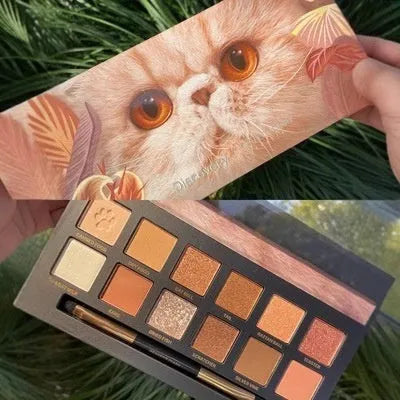 Twelve-colour animal eye shadow palette showing pressed powder shadows in various shades