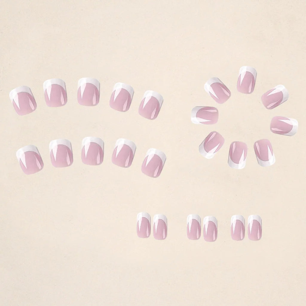 White plaid pattern artificial nail tips set with 24 pieces in an open box.