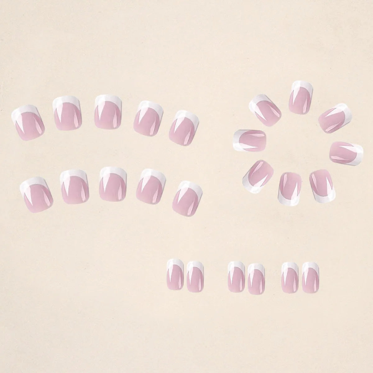 White plaid pattern artificial nail tips set with 24 pieces in an open box.