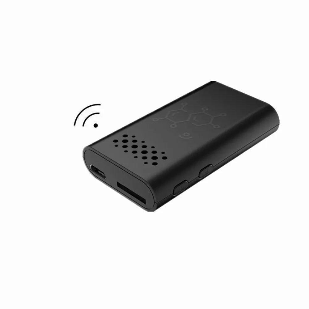 Black indoor smart security camera with WIFI and baby monitor functions on a table.