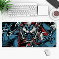 Large anime-themed gaming desk mouse pad with non-slip rubber cloth base on a wooden desk.