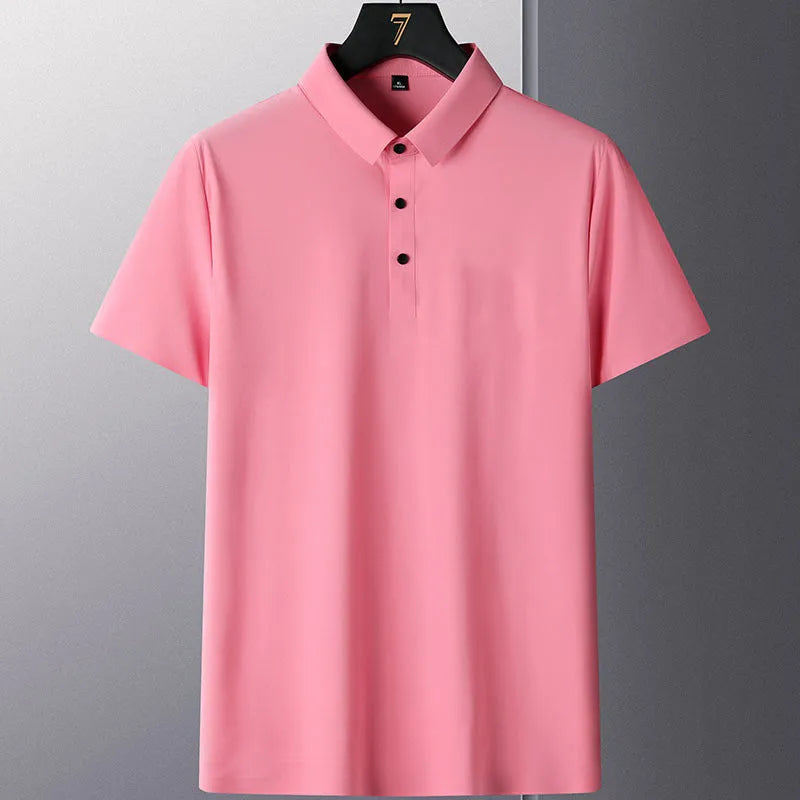 Man wearing a solid colour non-ironing short sleeve business casual shirt in a nylon blend fabric.