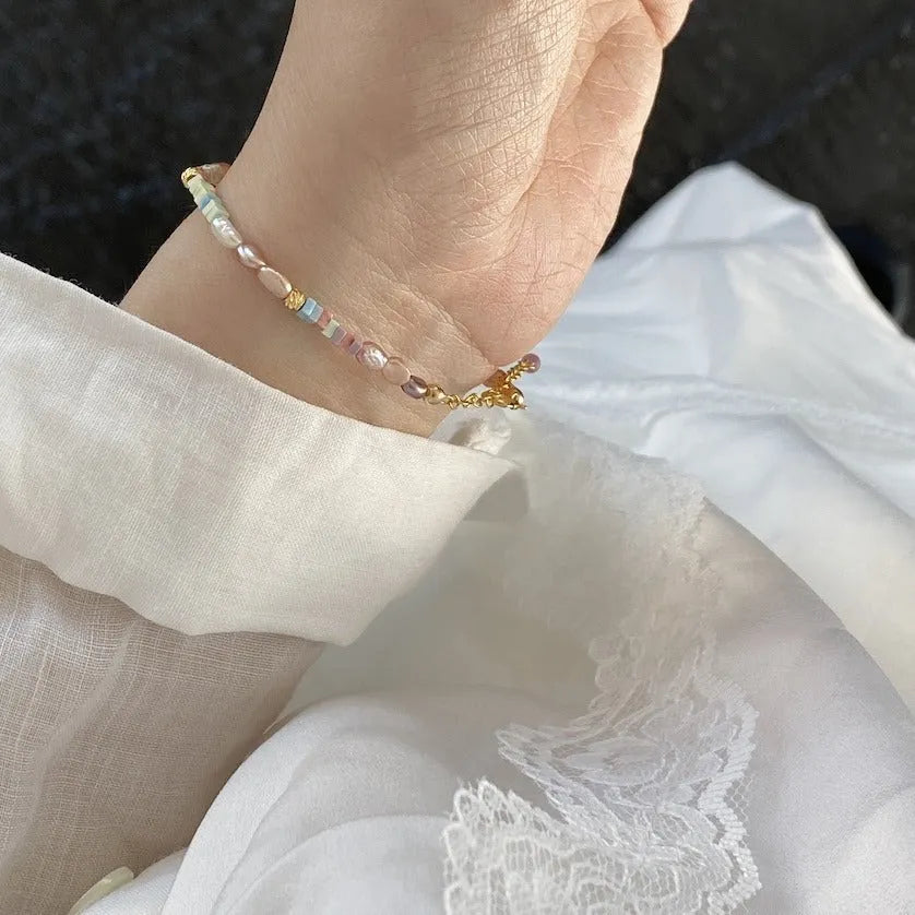 Natural pearl jewellery set with gilded 14K purple irregular mini pearls in bracelet and necklace