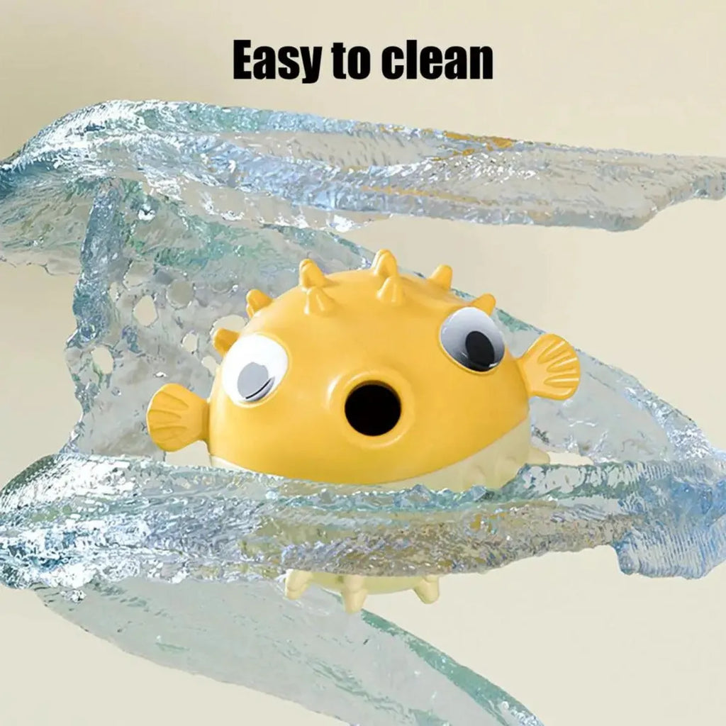 Yellow fish-shaped vinyl dog chew toy with textured surface and squeaker for aggressive chewers