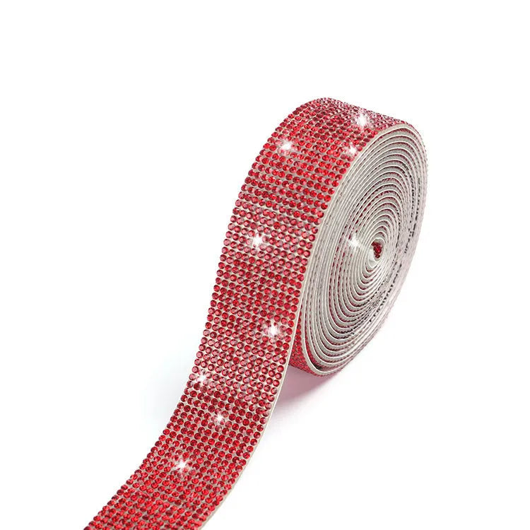 Long glass strip with self-adhesive backing for clothing decoration, shown in white and AB colour.