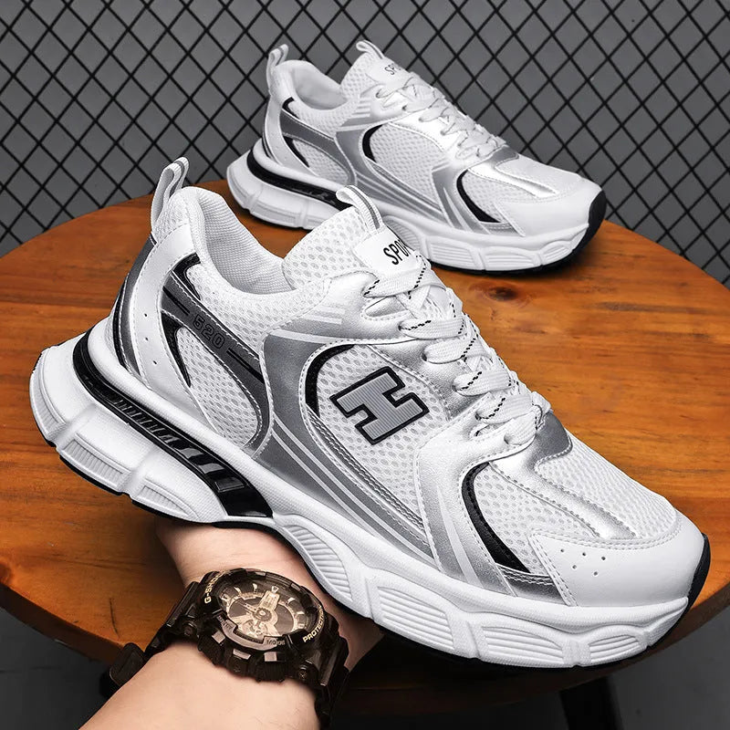 Men's mesh running shoes in black, white and grey, or white orange colours with plastic sole