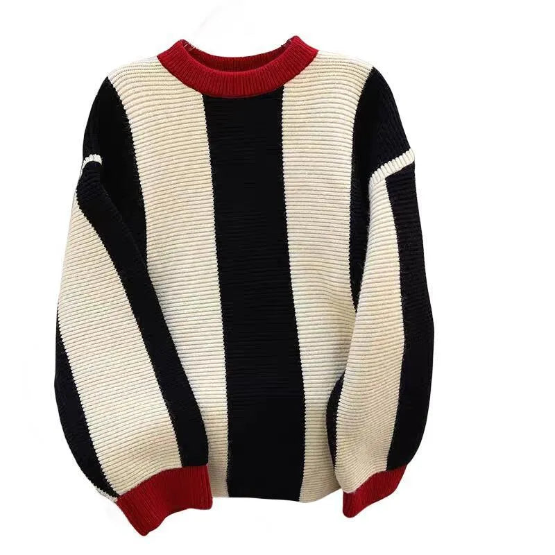 Women's striped cashmere knit pullover sweater with contrast colour and round neck.