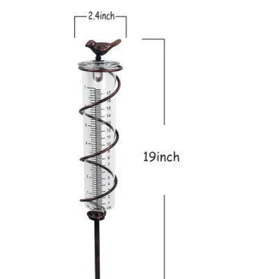 Garden rain gauge with cast iron bird decoration showing 0-800ml measurement scale