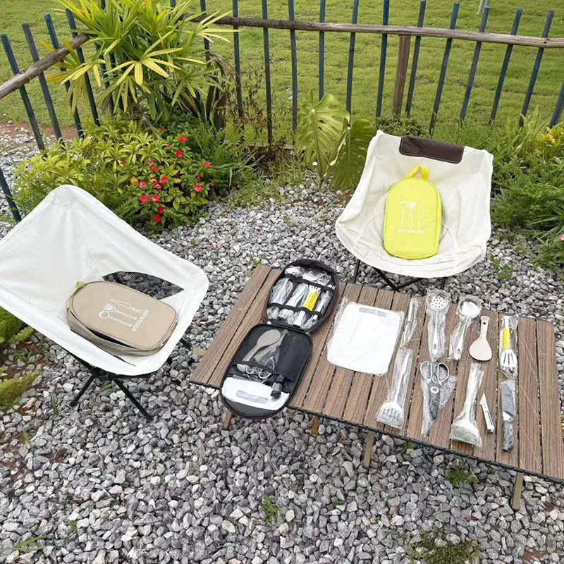 Portable picnic bag containing a 12-piece stainless steel kitchenware set.