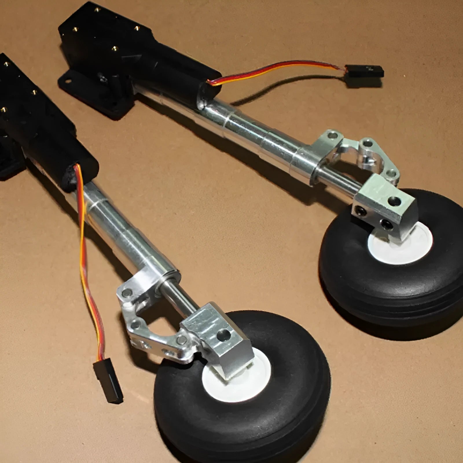 RC car alloy retractable landing gear with shock absorption and choice of wheel sizes