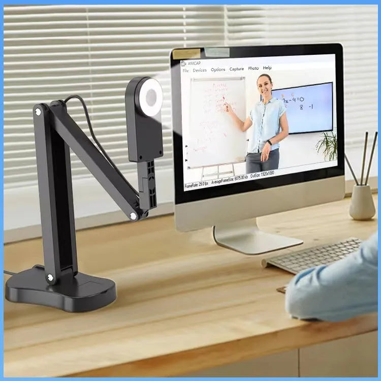 Black USB webcam with microphone for computer and mobile video calling, showing 8MP sensor and included data cable.