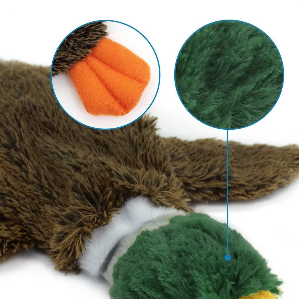 Green duck-shaped stuffless dog toy with squeakers and bottle insert opening