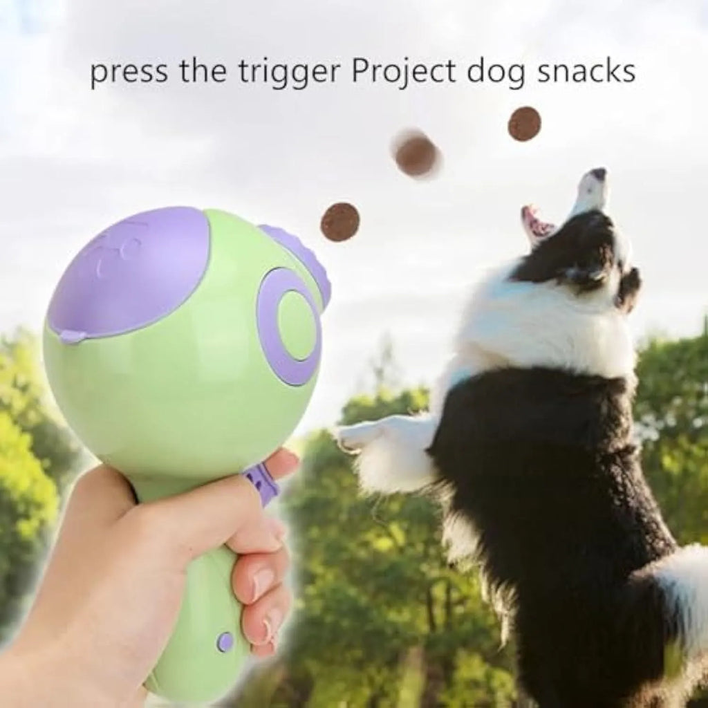15.5cm green dog treat launcher toy with remote feeding function on wooden floor