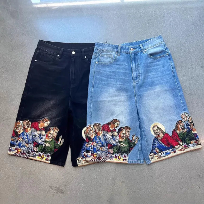 Men's blue cotton shorts with a printed design on the back pocket, showing tapered leg fit.