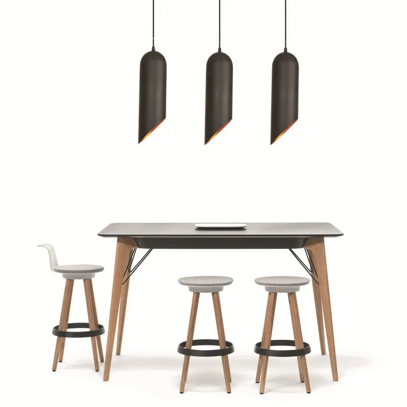 Retro iron art chandelier with matte black finish shown in bedroom setting
