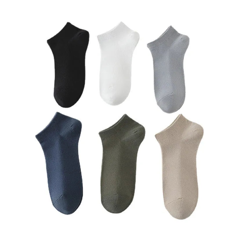 Men's solid colour low-cut polyester boat socks showing breathable fabric texture