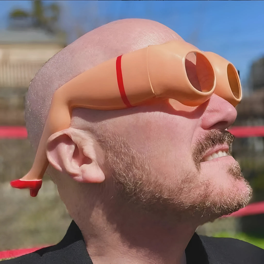 Orange novelty sunglasses with personality leg and hip design for adults