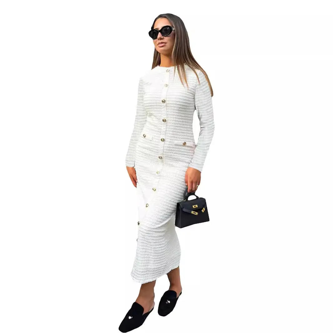 Black and white French retro slim fit knitted long-sleeved dress with button detail.