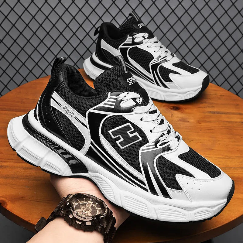 Men's mesh running shoes in black, white and grey, or white orange colours with plastic sole