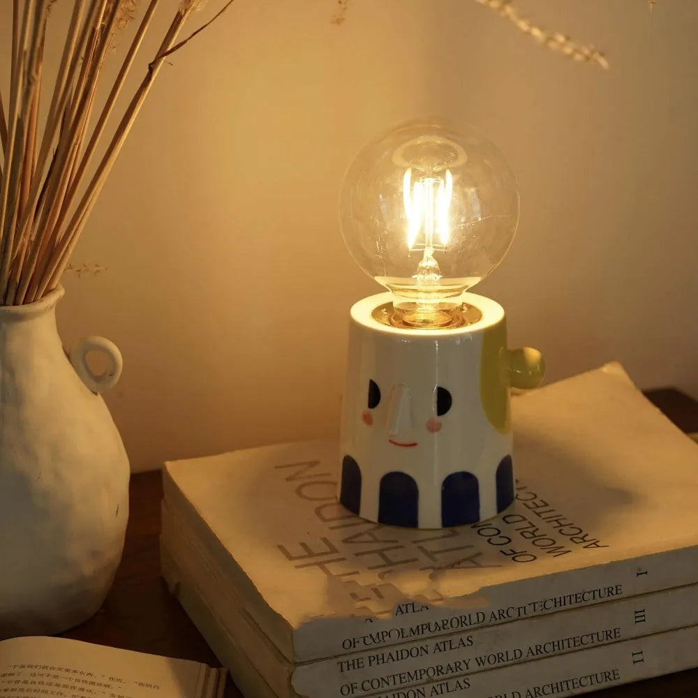 Handmade ceramic spherical ball headlight lamp on bedside table
