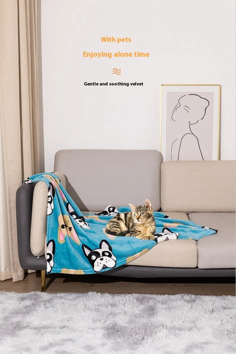 Blue dog cartoon pattern pet blanket laying flat, showing its double-sided thickened flannel texture.