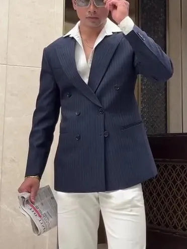 Man wearing a classic striped double-breasted polyester blazer jacket.
