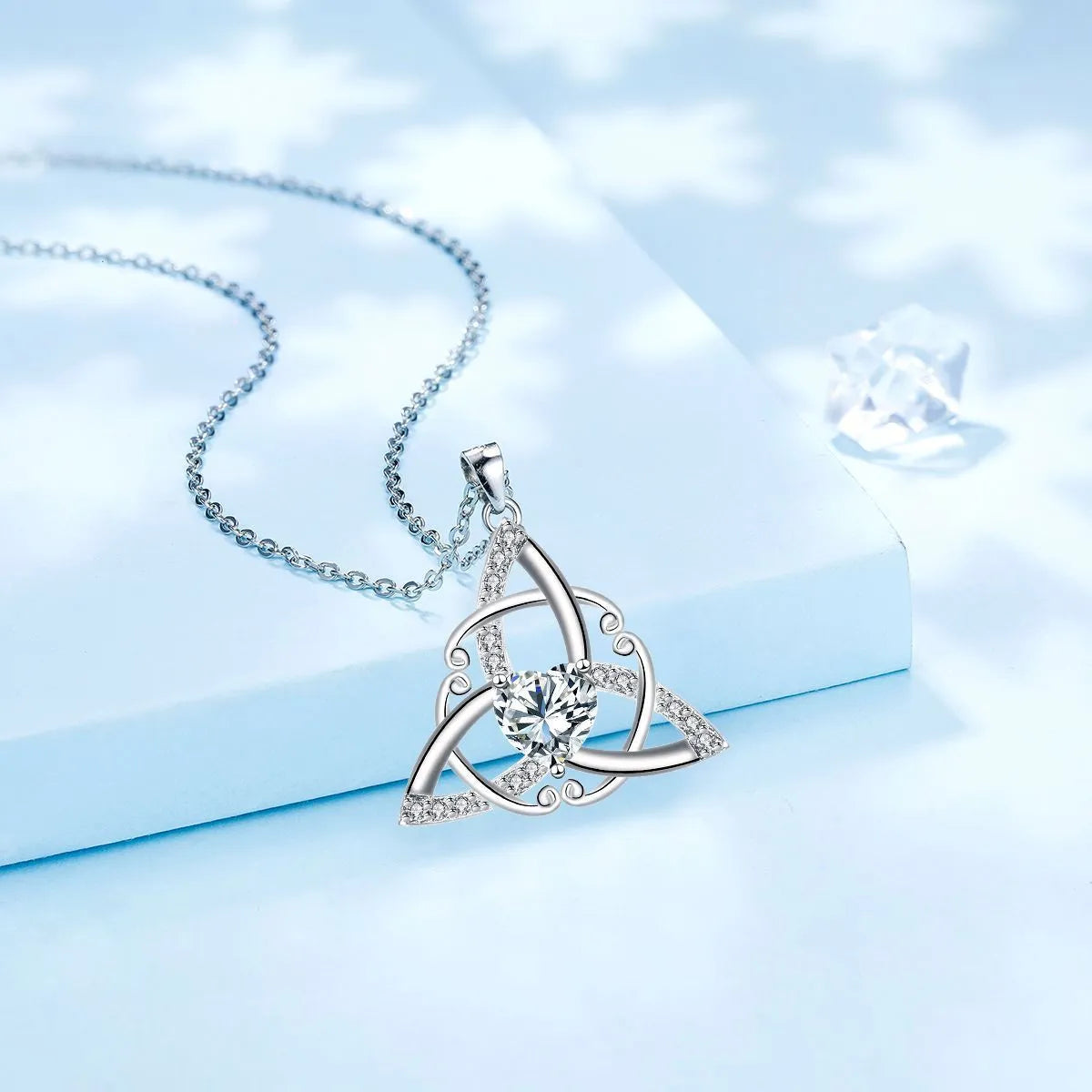 Women's Celtic knot necklace with geometric pendant in electroplated finish on copper chain