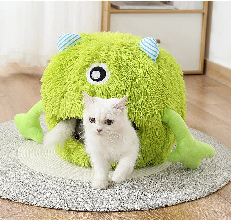 Round fluffy cat bed with soft plush surface and non-slip base