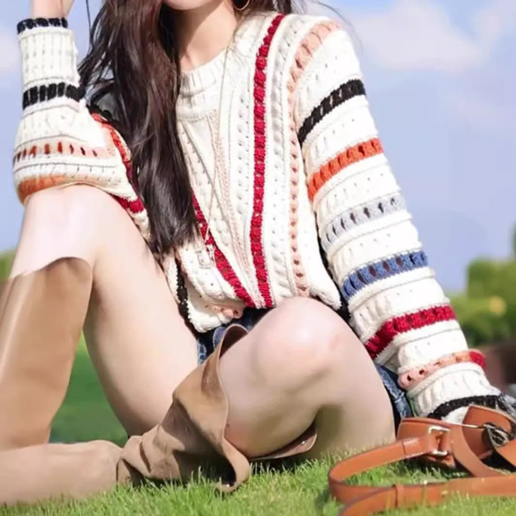 Rainbow striped batwing sleeve sweater with hollow knit construction in loose fit