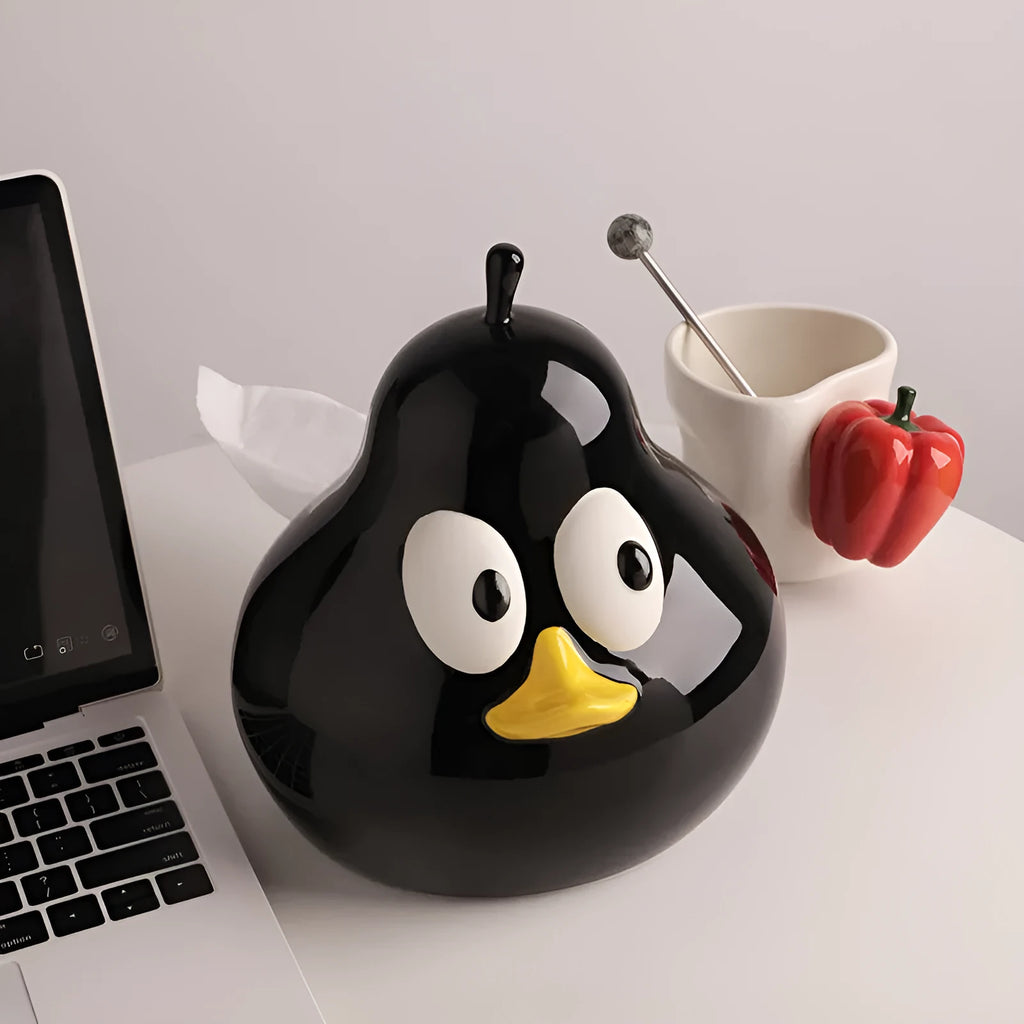White ceramic pear-shaped tissue box holder in animal style with green finish