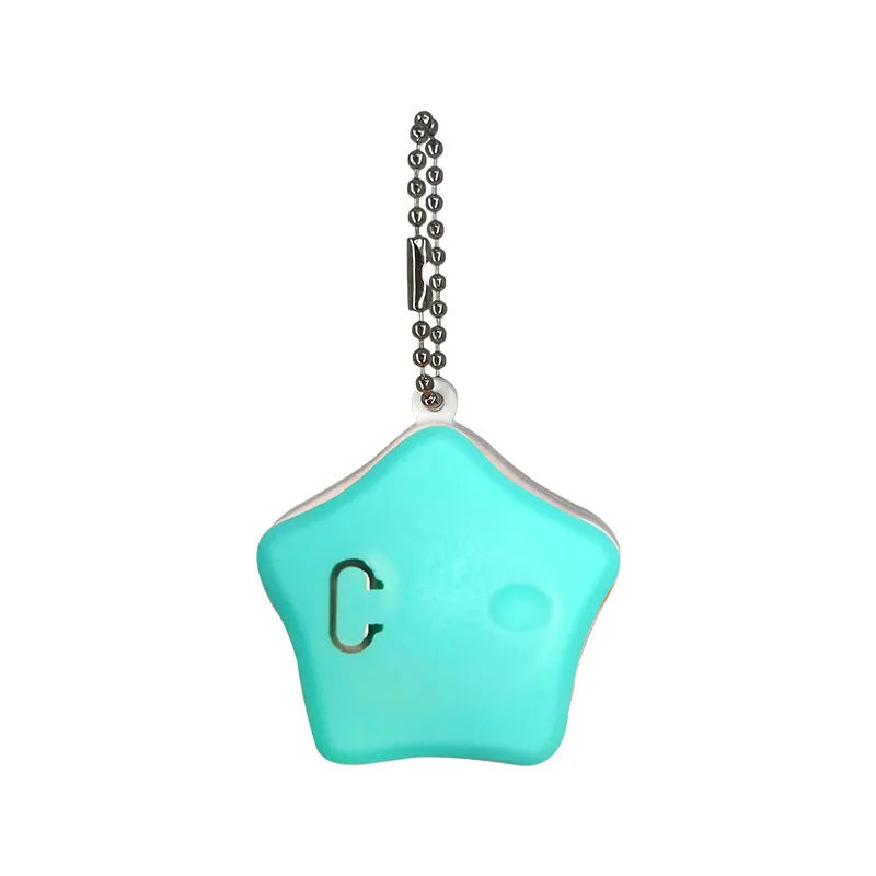 Blue rechargeable silicone pendant light for dog collar with LED on.