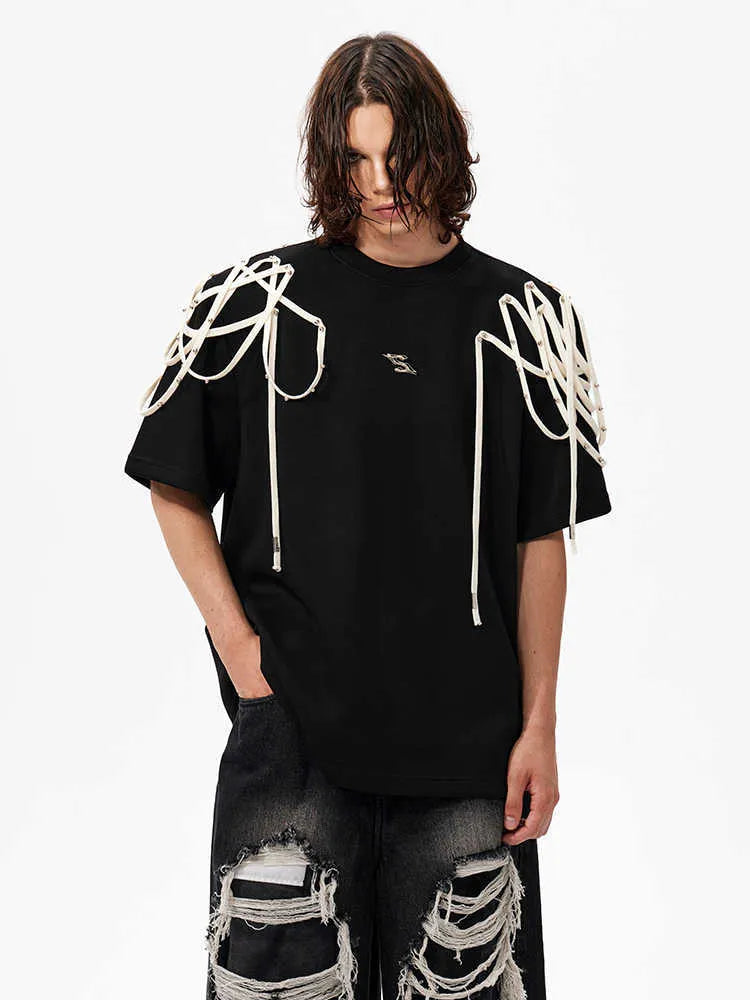 Black loose fit t-shirt with rivet ribbon padded shoulders and round neck collar