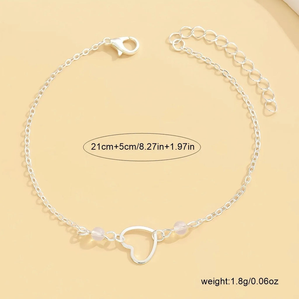 Women's adjustable anklet with heart pendant in gold or silver colour