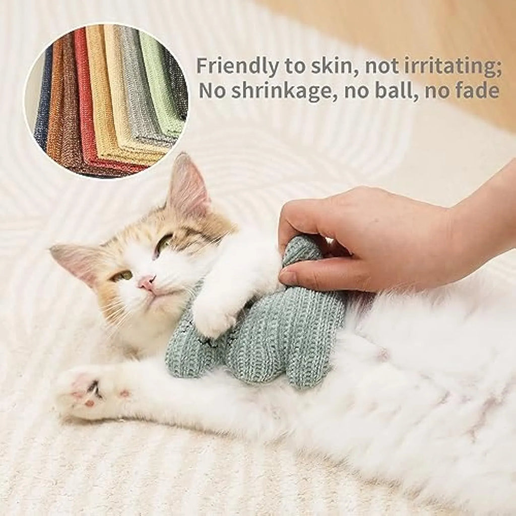 Cyan plush cat toy with rope details and a bell, shown next to a light coffee colour option.