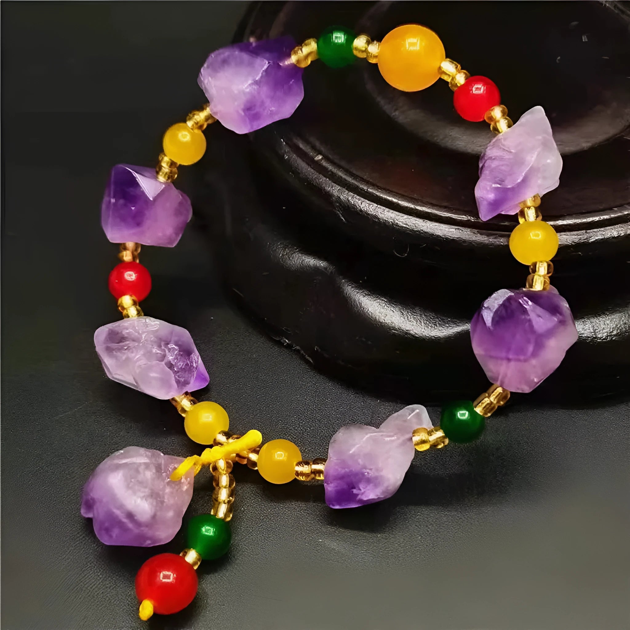 Natural shaped purple amethyst gemstone bracelet with a carved Fu character charm.