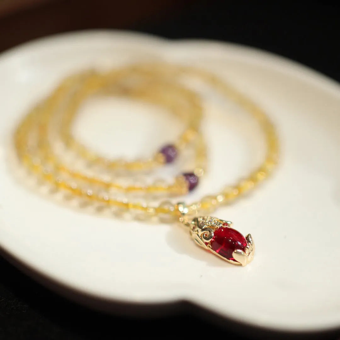 Natural Brazil gold rutilated quartz bracelet with three gold circles and ruby quartz hanging chopsticks charm