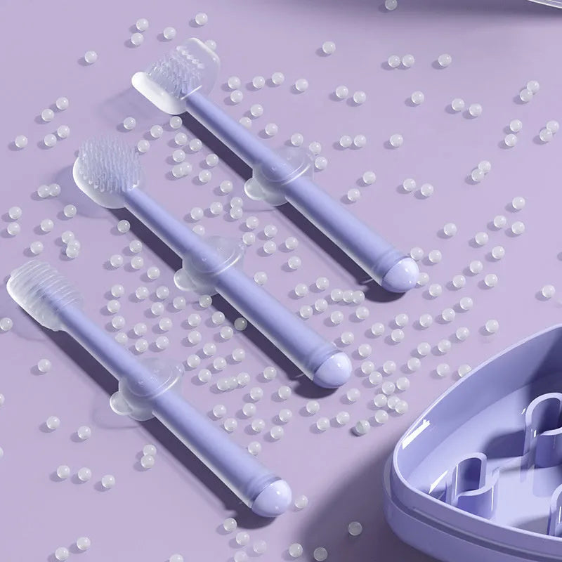 Soft silicone pet toothbrush for dogs and cats in blue, green, and purple colours.