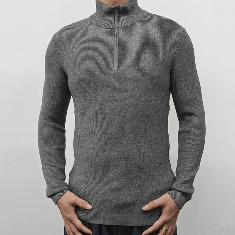 Men's black half-turtleneck zip-front sweater made from cotton blend fabric.